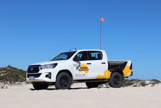 A 4WD parked on a sand terrain as the introductory 4wd course under recreational training.