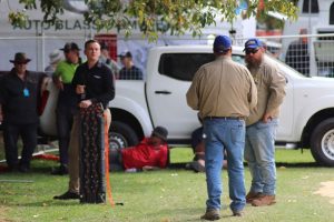 4WD drivers resting under a tree.