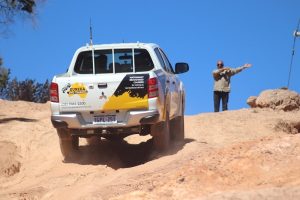 A 4WD from Eureka 4WD Training travelling on an off-road track.